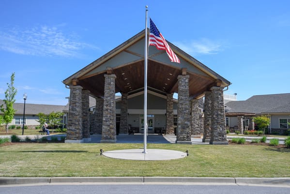The entrance of Oakview Park with an American flag