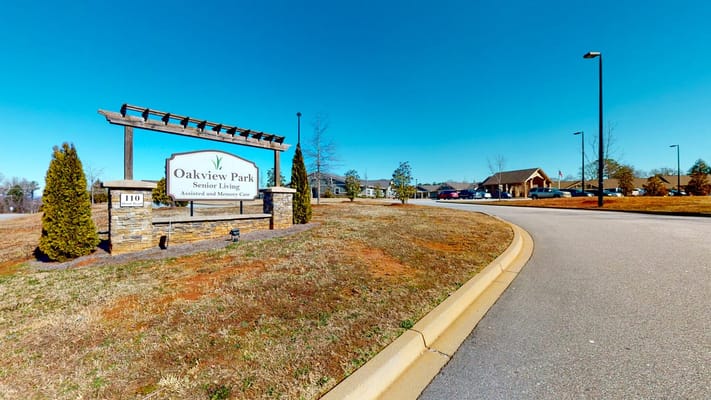 Entrance sign for Oakview Park Senior Living facility