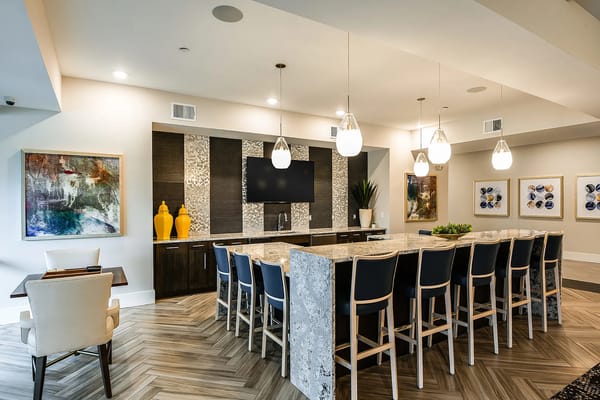 Interior view of a modern common area with bar seating