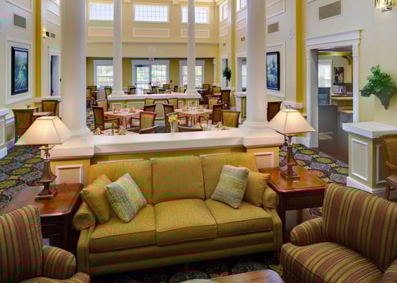 Dining area with elegant seating and decor