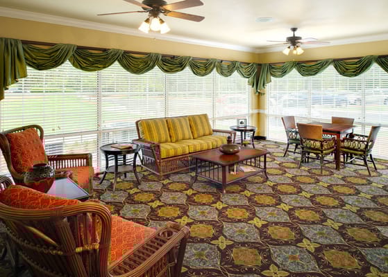 Bright common area with comfortable seating and natural light