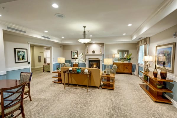Cozy living room with comfortable seating and a fireplace