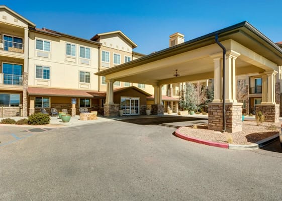 Main entrance of Palmilla Senior Living facility in Albuquerque, NM.
