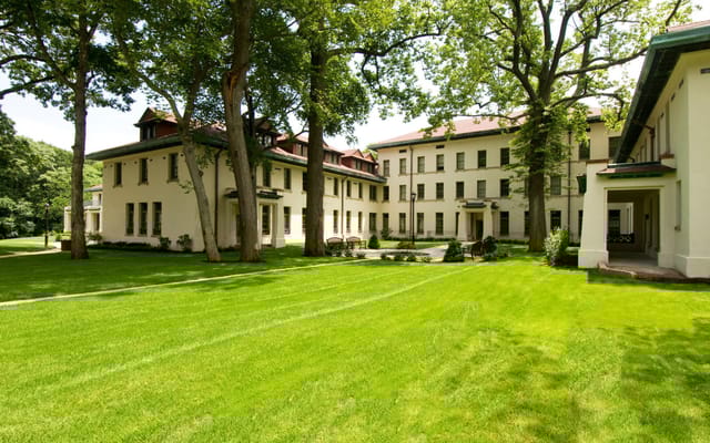 Exterior view of Park Lane at Sea View surrounded by trees