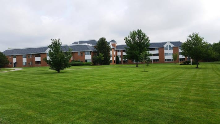 Exterior view of Peterson Meadows with manicured lawn