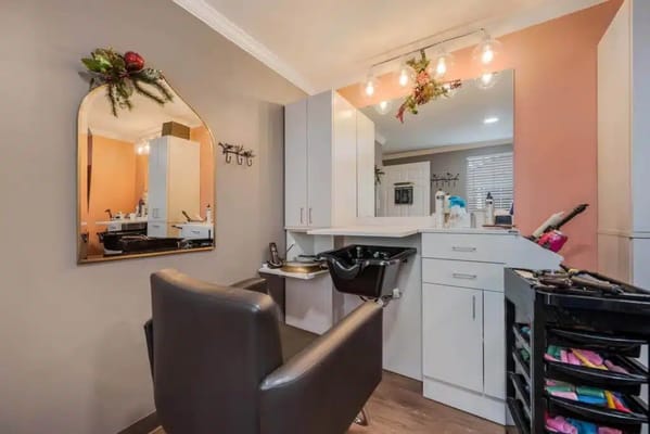 Salon chair and styling area in a retirement community.
