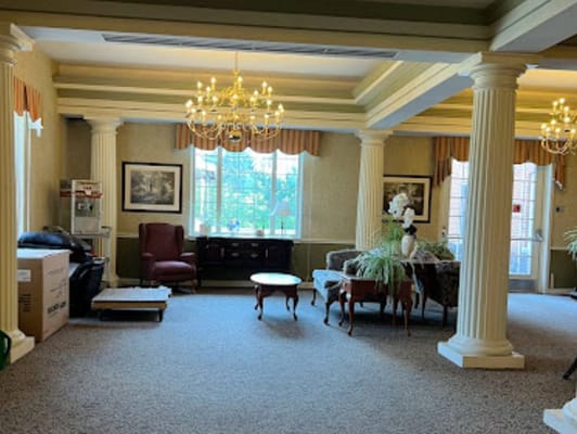 A well-furnished lobby area with elegant decor