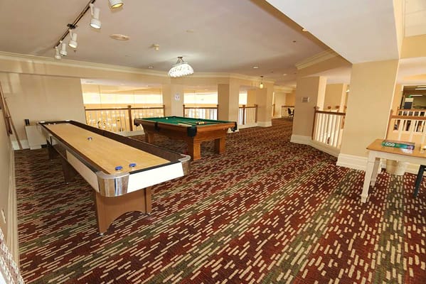 Common area with pool table and shuffleboard