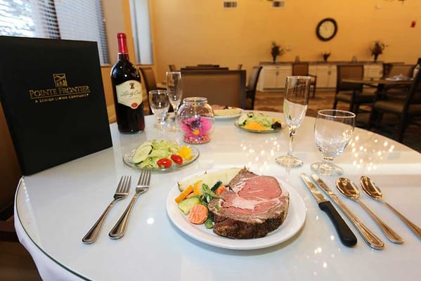 Elegant dining setup with meals and drinks