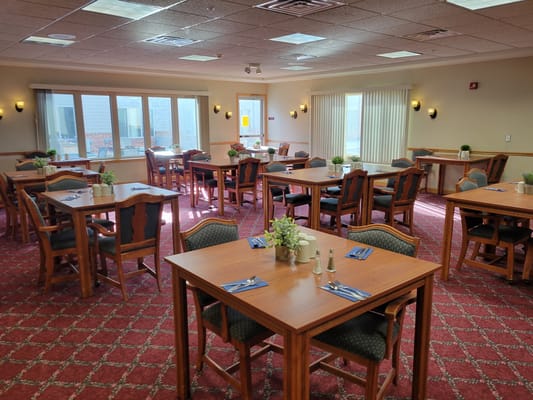 Bright dining room with neatly set tables