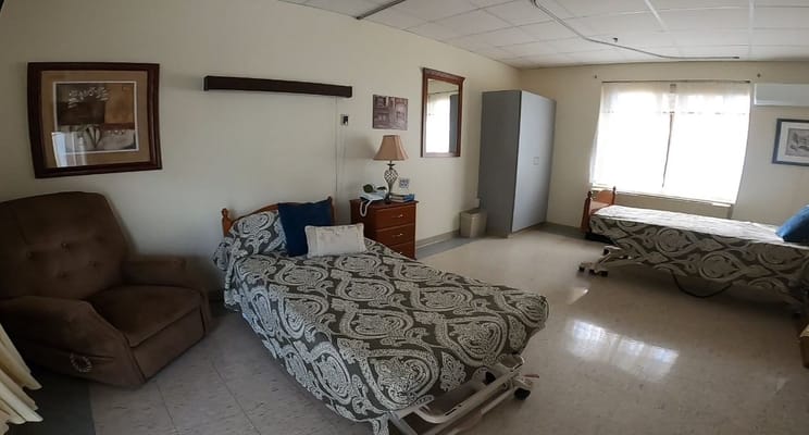 Interior view of a resident room with furniture