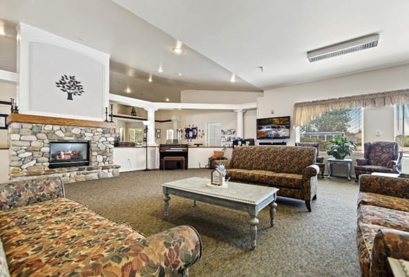 Cozy interior lounge area with floral couches