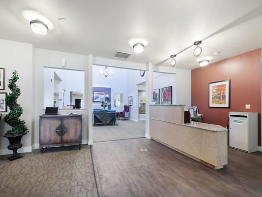 Bright common area with a reception desk