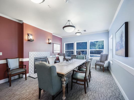 Cozy common area with seating and a fireplace