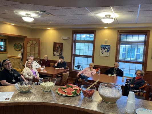 Residents enjoying a meal in the dining area
