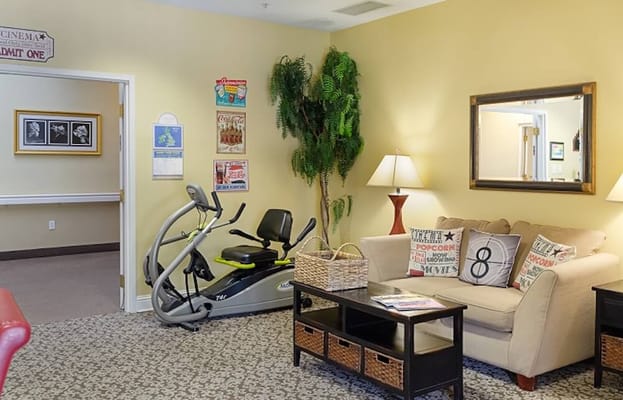 Interior view of a cozy activity room with exercise equipment