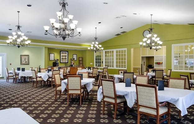 Bright dining room with well-set tables
