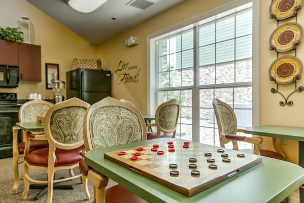 Checkers board game in a cozy game room