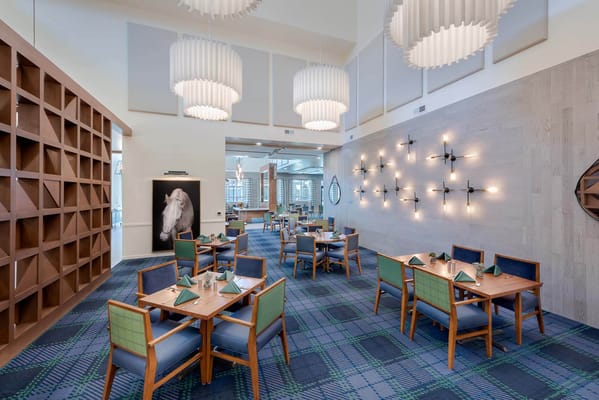 Dining area with tables and modern lighting