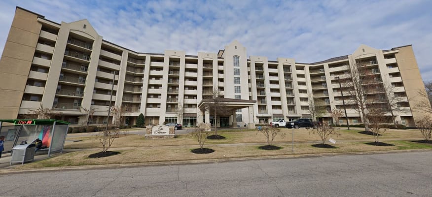 The exterior view of Richardson Terrace Housing with a grassy area in front.