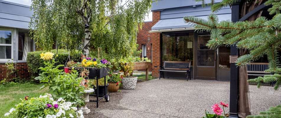 Colorful garden area with benches and flowers