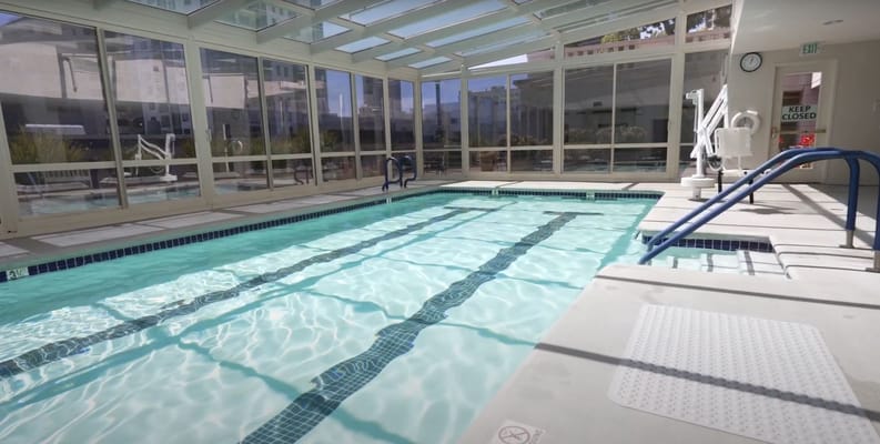 Indoor swimming pool with clear water and accessible entry
