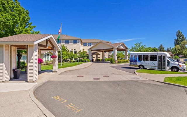 Entrance area of Sapphire at Moran Vista with a shuttle bus