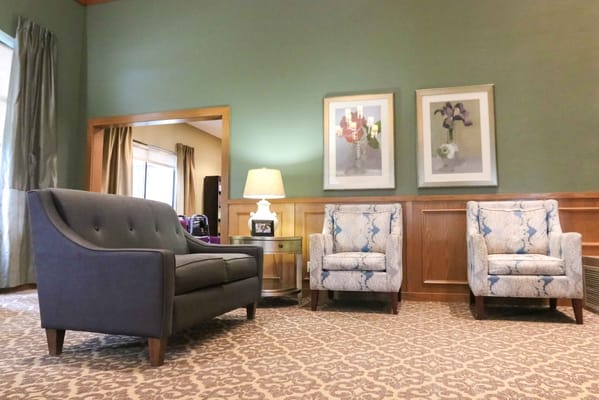 Cozy interior seating area with armchairs and couch