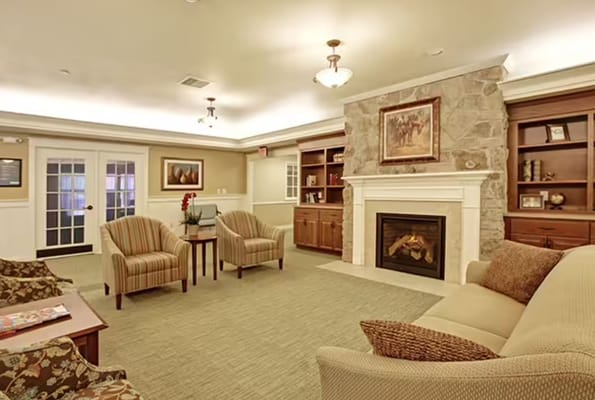 Cozy common area with seating and fireplace
