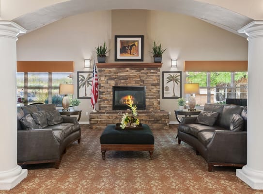 Spacious living room with comfortable seating and a fireplace