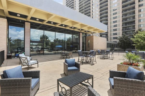 Outdoor patio area with seating for residents