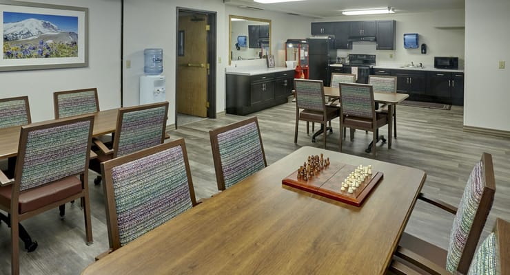 Interior common area with tables and chairs