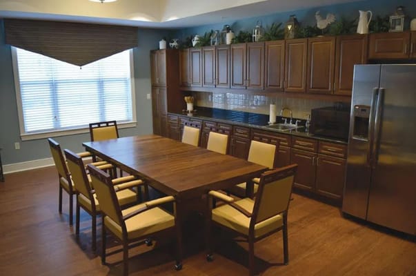 Bright dining area with wooden table and chairs
