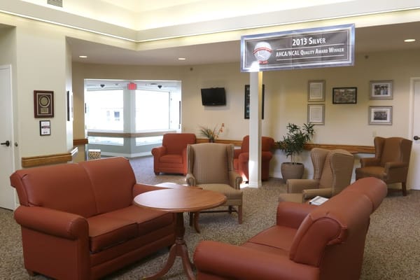 Inviting lobby with comfortable seating and award signage