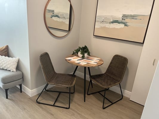 Cozy corner with chairs and a small table