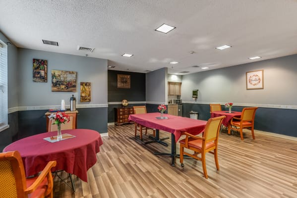 Interior common area with tables and chairs