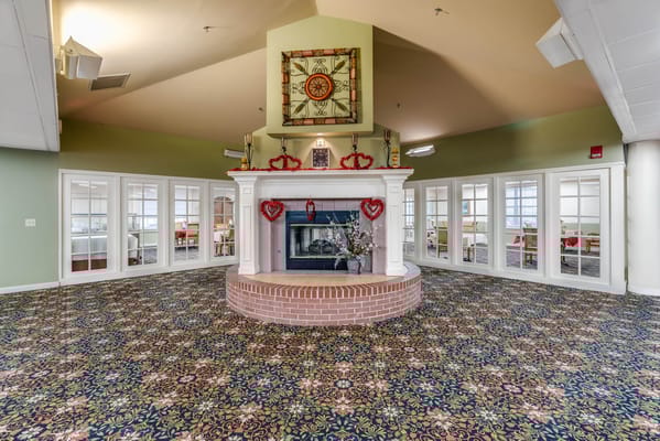 Interior common area with a fireplace and decorative elements