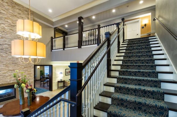 Interior view of a staircase in a senior living facility
