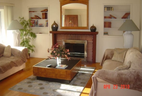 Cozy common area with seating and a fireplace