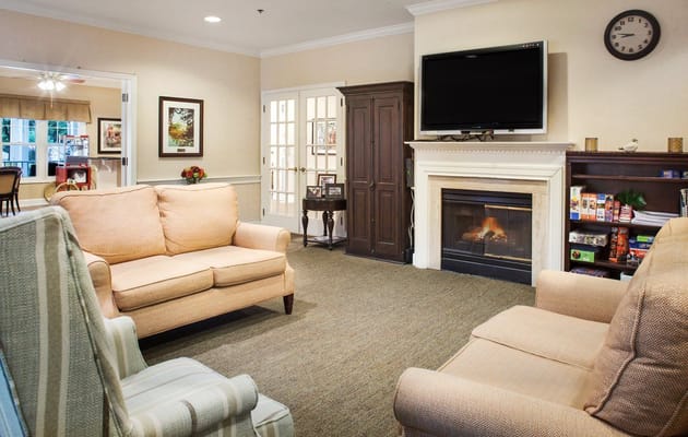 Cozy common area with seating and TV
