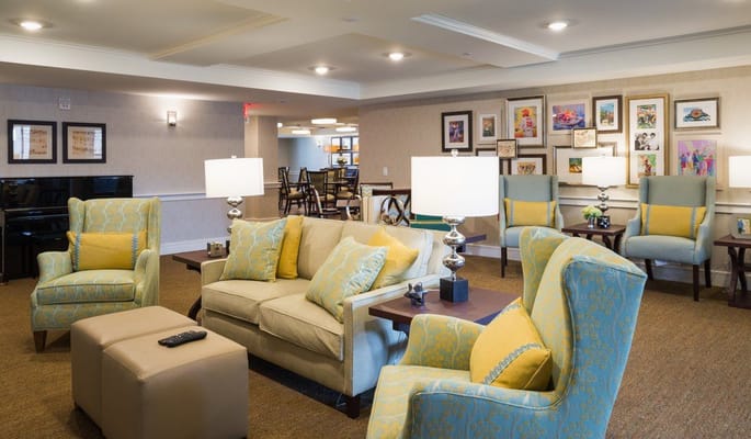 Bright common area with seating and artwork