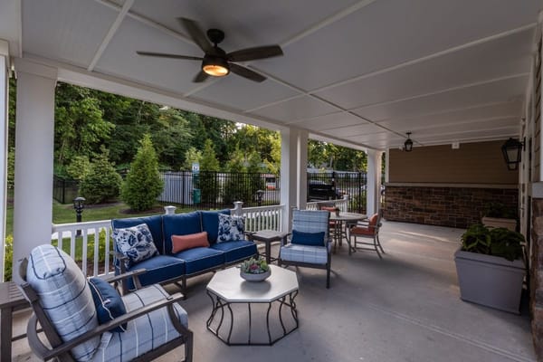 Outdoor seating area with furniture and landscaping