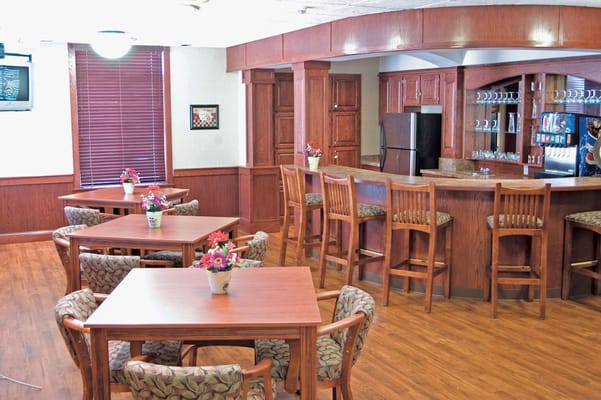 Cozy dining area with tables and floral centerpieces