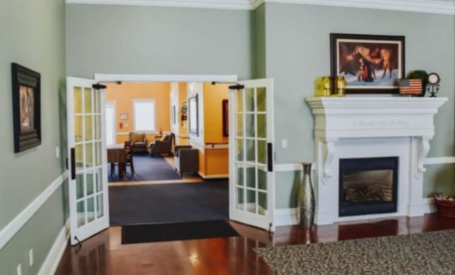 Interior view of a common area with open doors