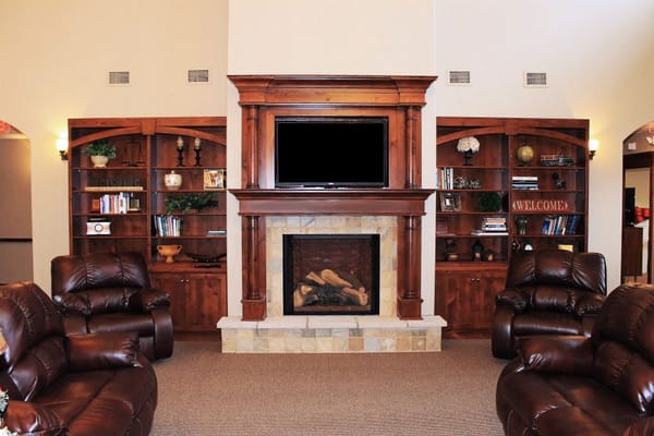 Cozy interior of a common area with a fireplace