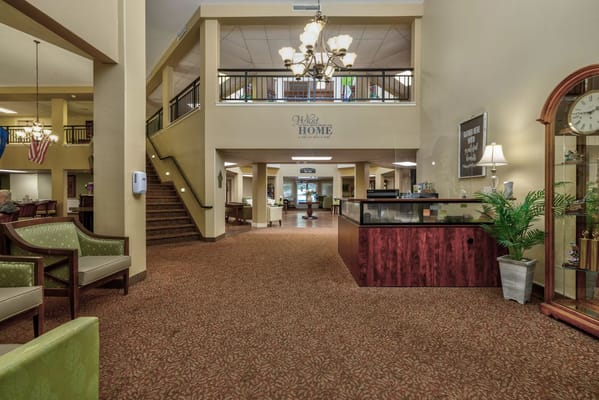 Bright lobby area with seating and decor