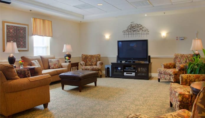 Cozy common area with comfortable seating and a television