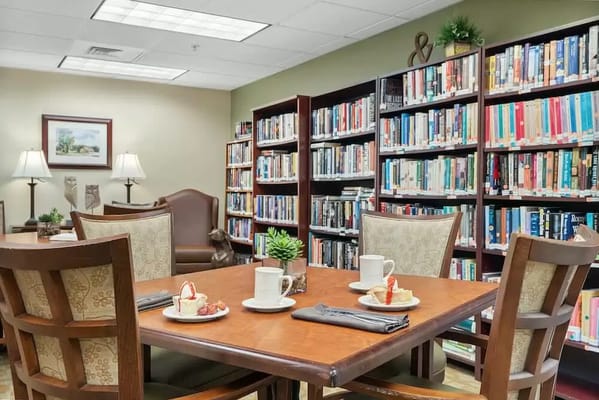 A cozy library area with snacks and drinks