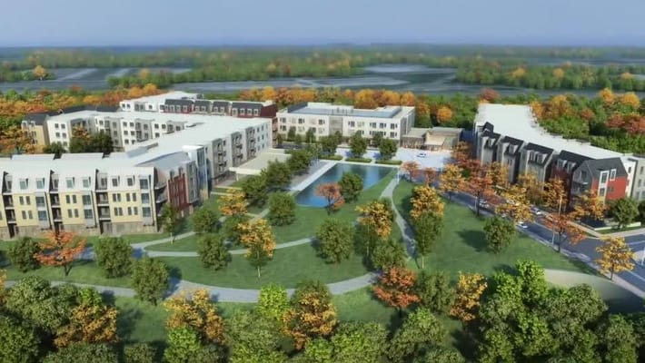 Aerial view of The Baldwin senior living facility surrounded by landscaped grounds.