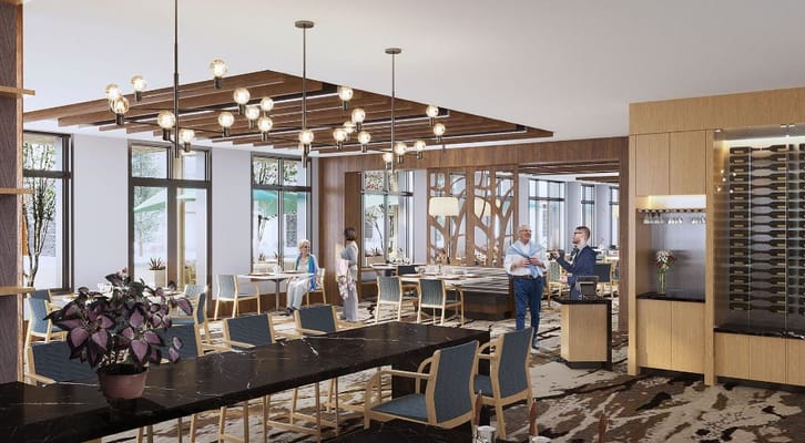 Modern dining area with tables, chairs, and residents interacting.